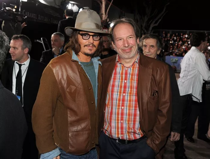 Johnny Depp (Rango), Harry Dean Stanton (Balthazar), Hans Zimmer zdroj: imdb.com 
promo k filmu