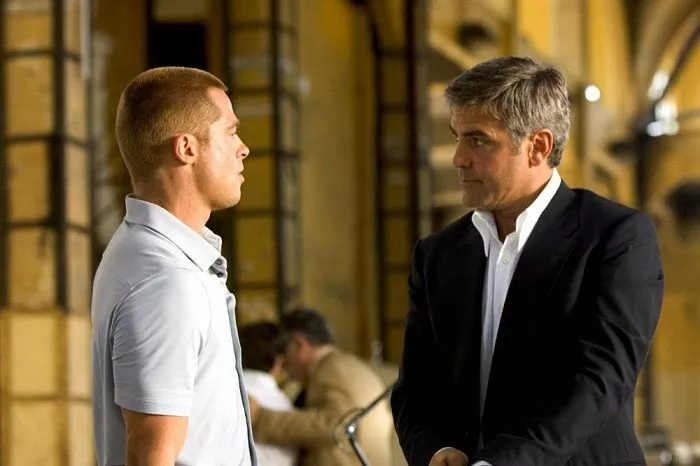 Brad Pitt (Rusty Ryan), George Clooney (Danny Ocean)