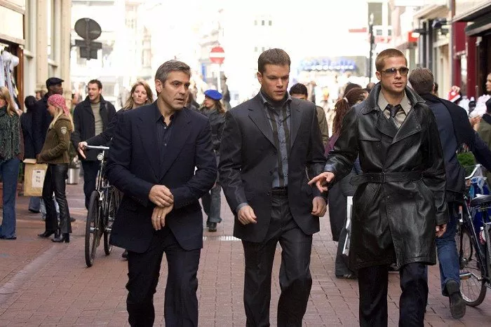 George Clooney (Danny Ocean), Matt Damon (Linus Caldwell), Brad Pitt (Rusty Ryan)