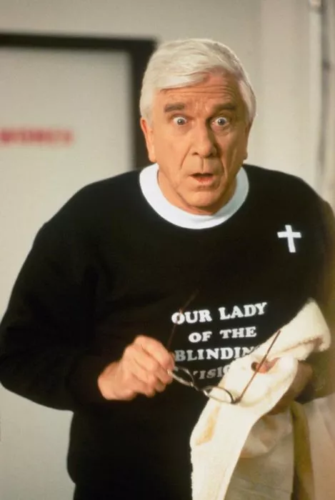 Leslie Nielsen (Father Jebedaiah Mayii)
