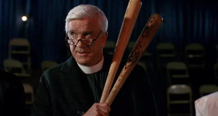 Leslie Nielsen (Father Jebedaiah Mayii)