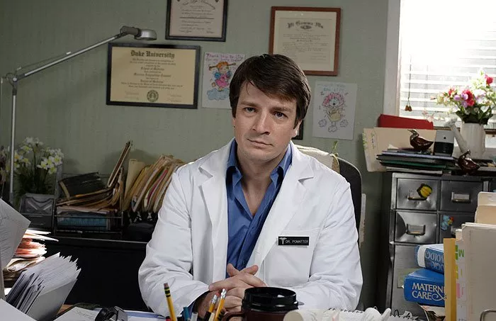 Nathan Fillion (Dr. Pomatter) Photo © Night and Day Pictures