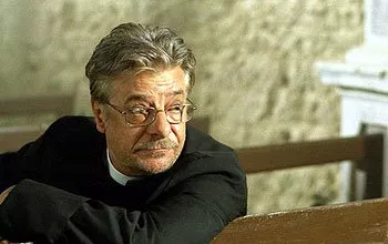 Giancarlo Giannini (Father Moretti)