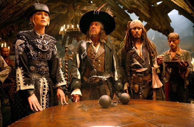 Keira Knightley (Elizabeth Swann), Geoffrey Rush (Captain Hector Barbossa), Johnny Depp (Jack Sparrow), Mackenzie Crook (Ragetti)