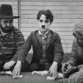 Chaplin vystěhovalcem (1917) - Bearded cheating gambler