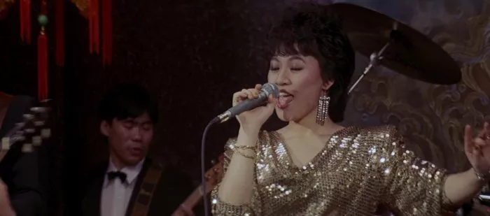 Rok draka (1985) - Shanghai Palace Singer