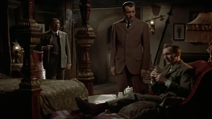 Christopher Lee (Sir Henry), Peter Cushing (Sherlock Holmes), André Morell (Doctor Watson) zdroj: imdb.com