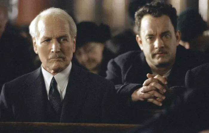 Paul Newman (John Rooney), Tom Hanks (Michael Sullivan) zdroj: imdb.com