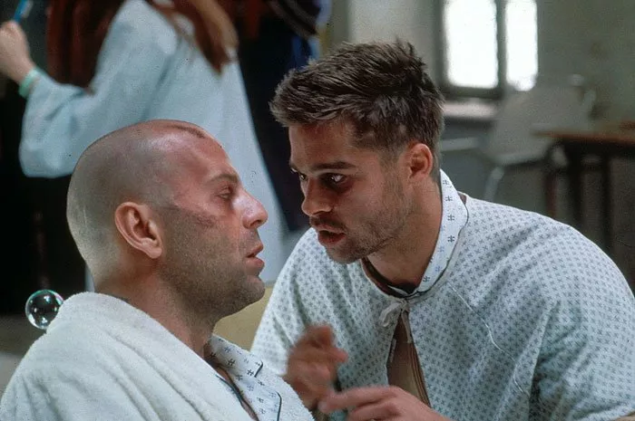 Bruce Willis (James Cole), Brad Pitt (Jeffrey Goines)