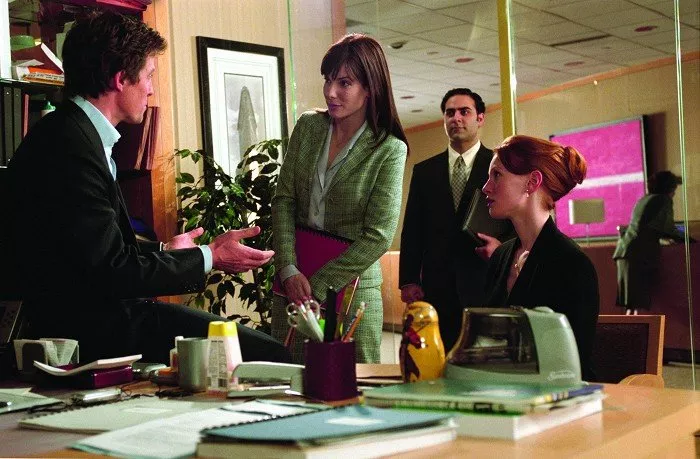 Hugh Grant (George Wade), Sandra Bullock (Lucy Kelson), Jason Antoon (Norman), Alicia Witt (June Carver)