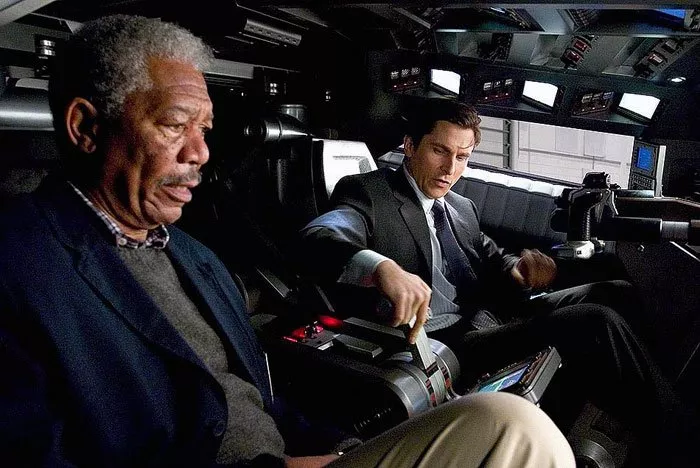 Morgan Freeman (Lucius Fox) Photo © Warner Bros.