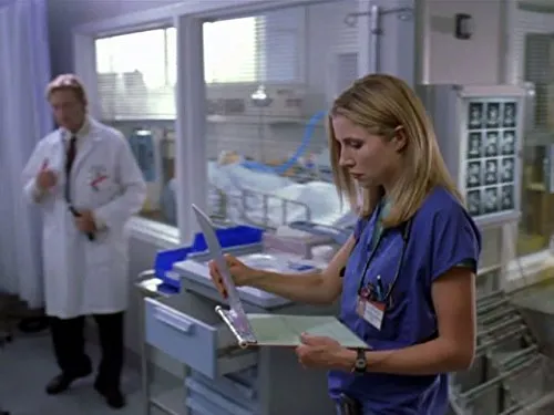 Sarah Chalke (Dr. Elliot Reid), Ken Jenkins (Dr. Bob Kelso) zdroj: imdb.com