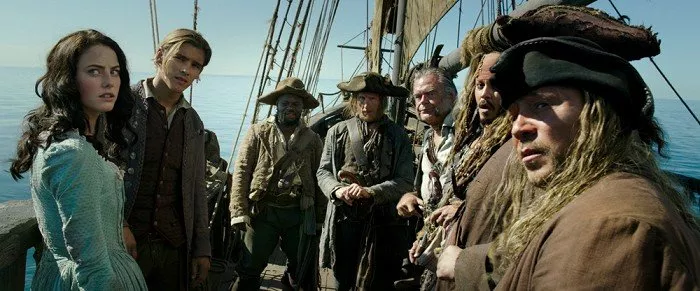 Kaya Scodelario (Carina Smyth), Brenton Thwaites (Henry Turner), Kevin McNally (Gibbs), Johnny Depp (Captain Jack Sparrow), Stephen Graham (Scrum)