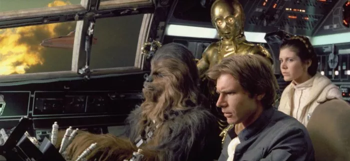 Harrison Ford (Han Solo), Carrie Fisher (Princess Leia), Anthony Daniels (C-3PO), Peter Mayhew (Chewbacca) zdroj: imdb.com