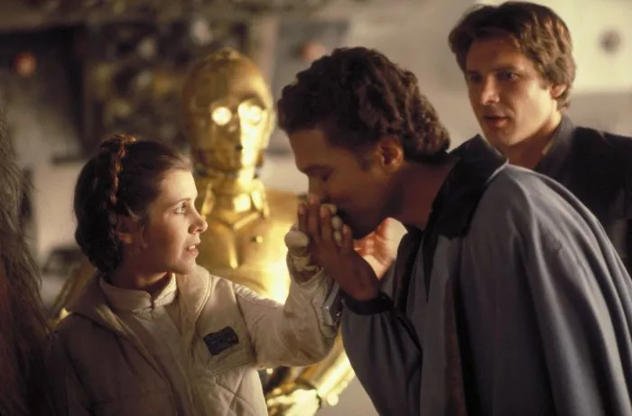 Harrison Ford (Han Solo), Carrie Fisher (Princess Leia), Anthony Daniels (C-3PO), Billy Dee Williams (Lando Calrissian) zdroj: imdb.com