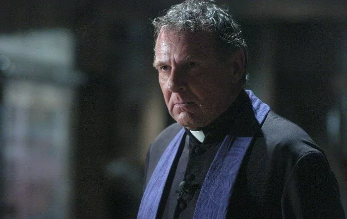 Tom Wilkinson (Father Moore)