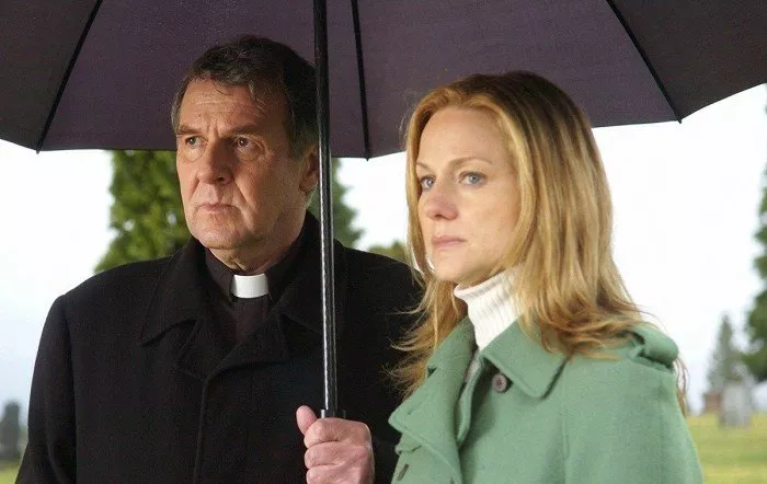 Tom Wilkinson (Father Moore)